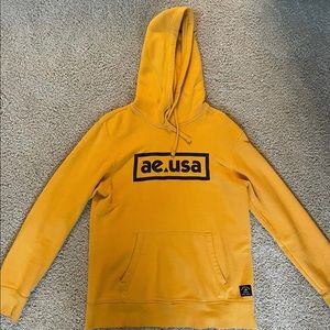 American Eagle yellow box hooded sweatshirt